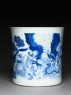 Blue-and-white brush pot with demons in a river (side)