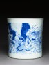 Blue-and-white brush pot with demons in a river (side)