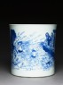 Blue-and-white brush pot with demons in a river (side)