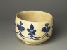 Mortar-shaped bowl with vegetal decoration (oblique)