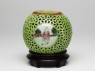 Porcelain cricket cage with three roundels depicting figures (side)