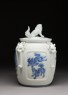 Water jar surmounted by a shishi, or lion dog (side)