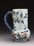 Tankard with modelled flowers and leaves (side)