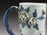 Tankard with modelled flowers and leaves (detail, flowers near handle)