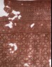 Textile fragment with interlocking spirals (detail)