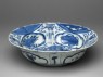 Blue-and-white kraak style bowl with banana leaf and flowers (oblique)