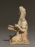 Figure of a harpist (oblique)