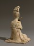 Figure of a flautist (back)