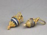 Gold earrings with lapis lazuli, ivory, and quartz pendants (oblique)