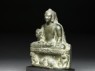 Seated figure of the Buddha (side)