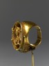 Ring with bust figure holding a wine cup (side)