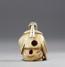 Netsuke in the form of a Nō actor wearing a mask (back)