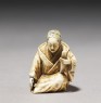 Netsuke in the form of a Nō actor wearing a mask (oblique)
