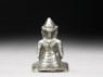 Silver amulet in the form of the Buddha (back)