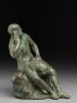 Figure of the hero god Heracles with his club seated on a lion (side)