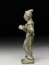 Female figure with heavy anklets (side)