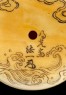 Manjū netsuke depicting the Daoist immortal Bashikō performing acupuncture on a dragon (detail)