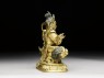 Figure of Vaishravana on a lion (side)