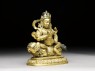 Figure of Vaishravana on a lion (side)