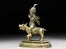 Figure of Las Mkhan damar po, acolyte of Beg-tse god of war, on a wolf (side)