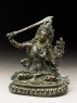 Figure of Manjushri wielding a sword (side)