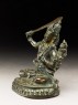 Figure of Manjushri wielding a sword (side)