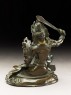 Figure of Manjushri wielding a sword (side)