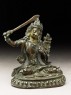 Figure of Manjushri wielding a sword (side)