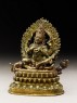 Figure of Mahakala seated on a corpse upon a lotus-petalled throne (side)