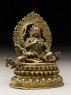 Figure of Mahakala seated on a corpse upon a lotus-petalled throne (side)