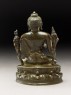 Seated figure of the Buddha with flowers, stupa, and bottle (back)