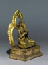 Seated figure of the Buddha with a mandala (side)