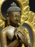 Seated figure of the Buddha with a mandala (detail)