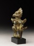 Figure of a bird deity (side)