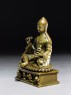 Seated figure of a lama (side)