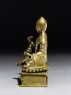 Seated figure of a lama (side)