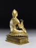 Seated figure of a lama (side)