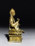 Seated figure of a lama (side)