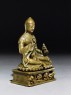 Seated figure of a lama (side)