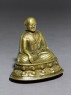 Seated figure of a lama (oblique)