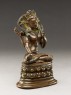 Seated figure of a female deity (side)