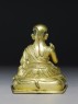 Seated figure of Tashi Lama (back)