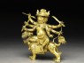 Figure of Dam can Dorje legs pa on a lion (side)