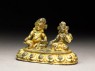 Figure of a male deity and his consort on a lotus-petalled throne (side)