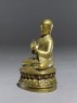 Figure of a seated lama (side)