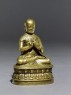 Figure of a seated lama (side)