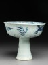 Blue-and-white stem cup with a dragon and clouds (side)
