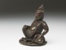 Figure of Kubera, god of wealth (side)