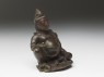 Figure of Kubera, god of wealth (side)