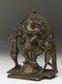 Dancing figure of Ganesha with attendants (side)